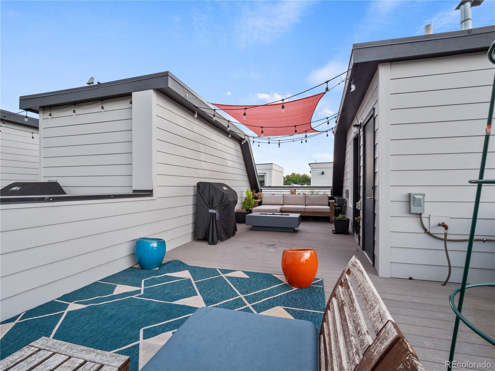 1284 Stuart Street Denver, CO 80204 - Photo 20 of 27 a backyard of a house with seating space
