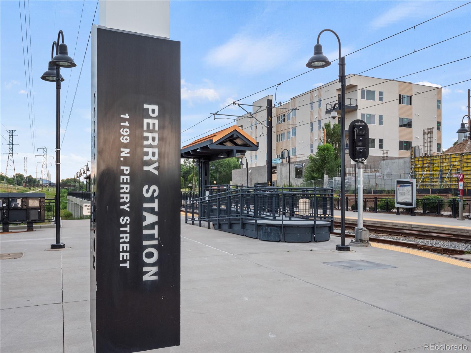 1284 Stuart Street Denver, CO 80204 - Photo 23 of 27 a view of a building with sitting area