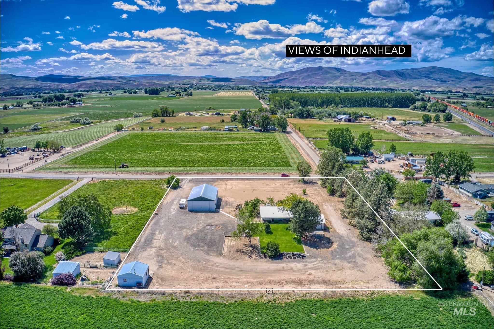 748 Pringle Road Weiser, ID 83672 - Photo 47 of 47 Expansive property with multiple outbuildings, including a large metal barn and two smaller sheds
