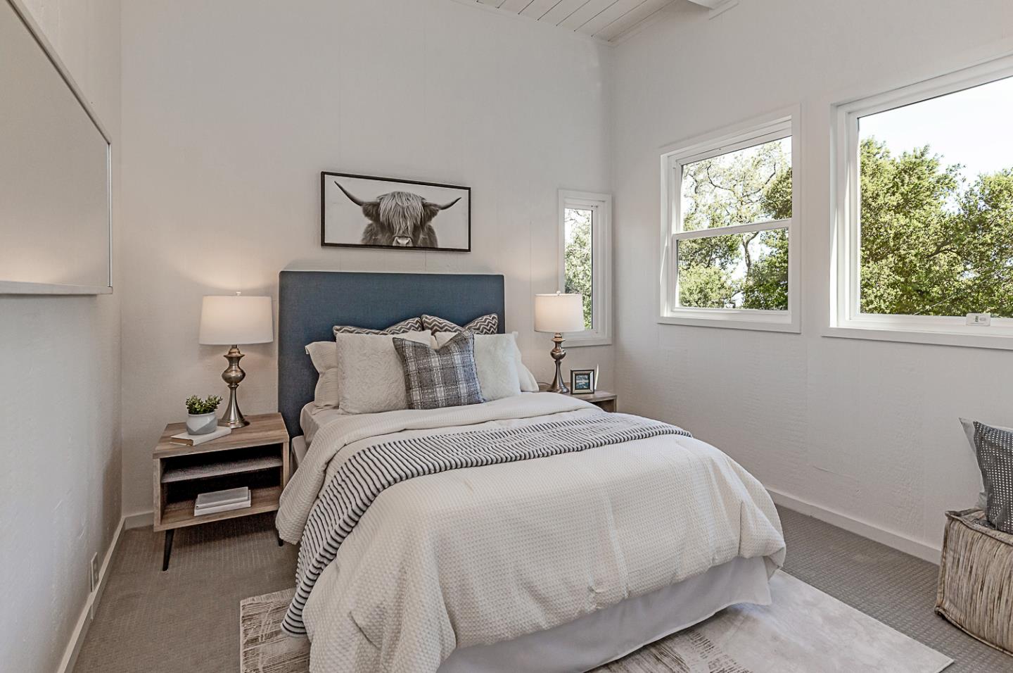 128 Los Trancos Circle Portola Valley, CA 94028 - Photo 14 of 38 a bedroom with a bed and a window