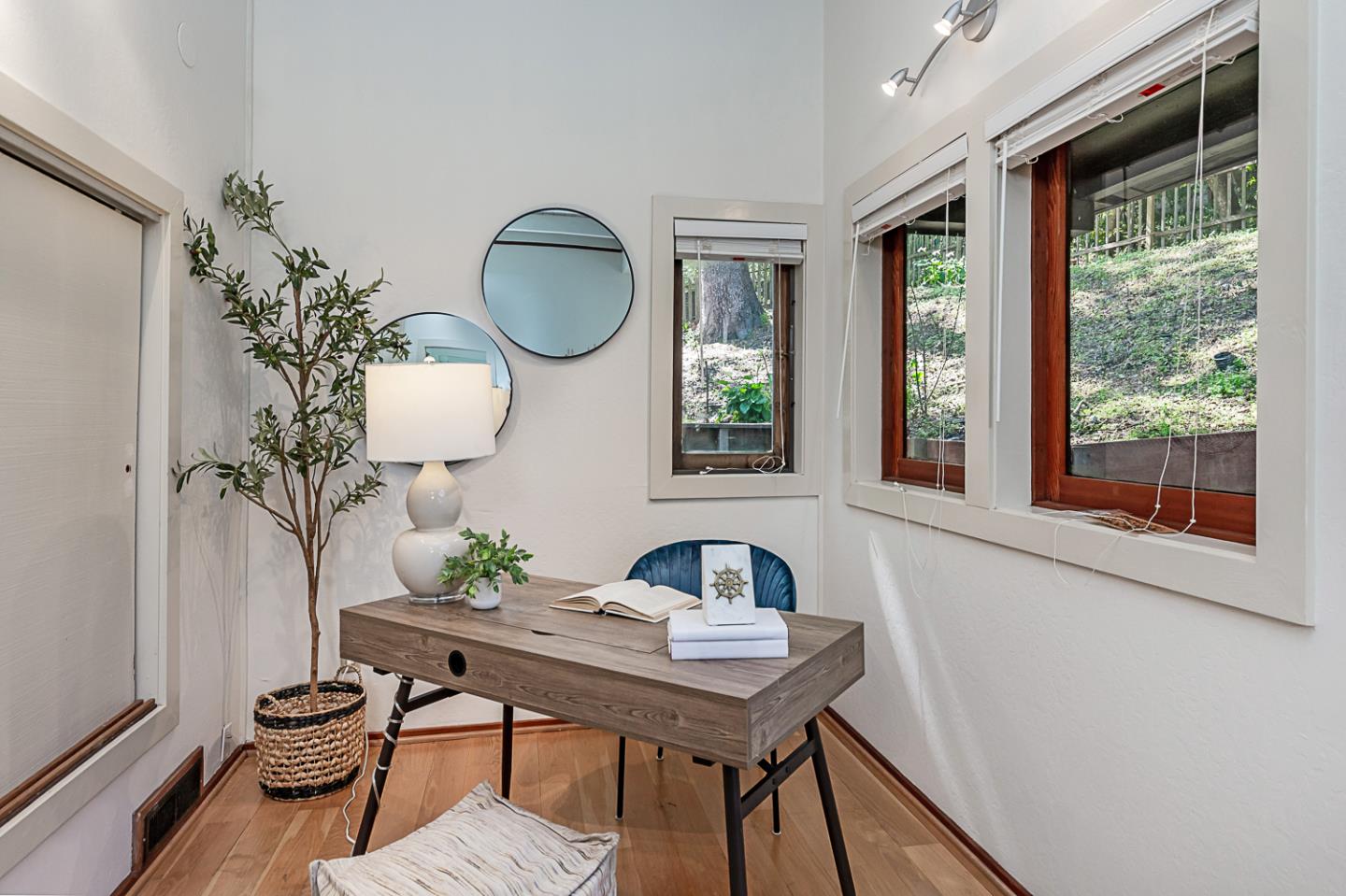 128 Los Trancos Circle Portola Valley, CA 94028 - Photo 17 of 38 a view of a workspace room with furniture window and wooden floor