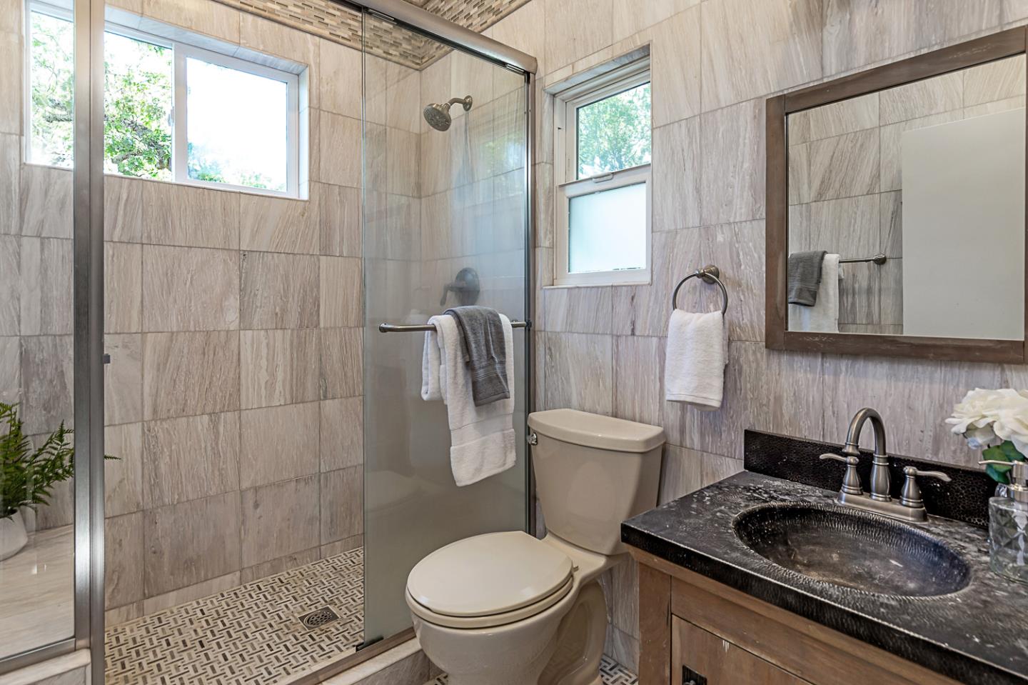 128 Los Trancos Circle Portola Valley, CA 94028 - Photo 20 of 38 a white toilet sitting next to a bathroom sink