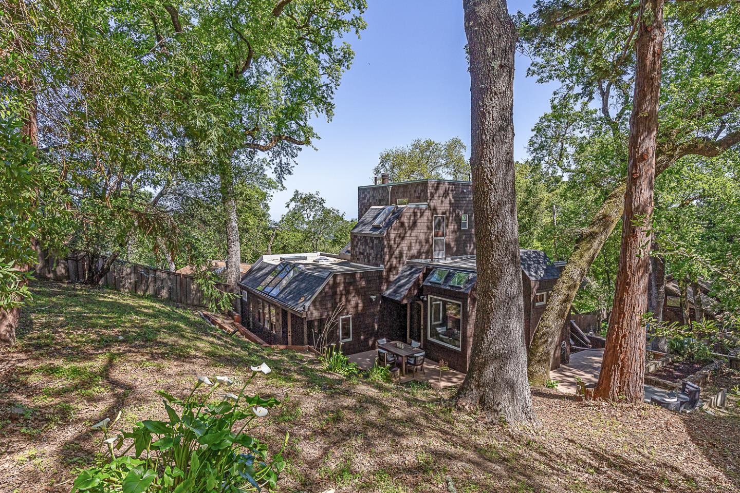 128 Los Trancos Circle Portola Valley, CA 94028 - Photo 22 of 38 a view of a house with a yard and sitting area