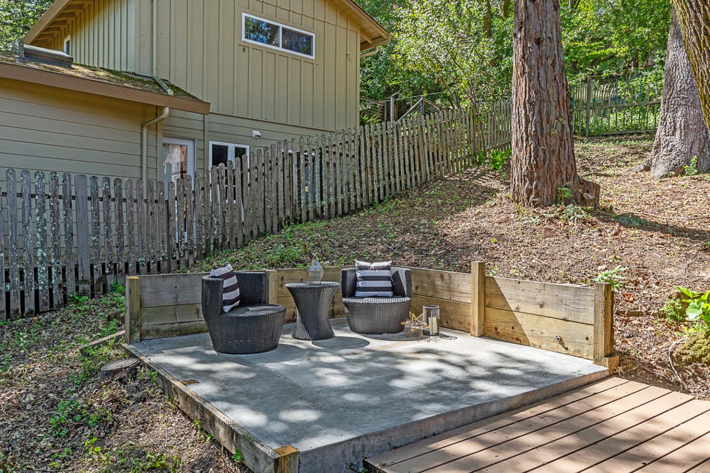 128 Los Trancos Circle Portola Valley, CA 94028 - Photo 27 of 38 a view of a patio with table and chairs