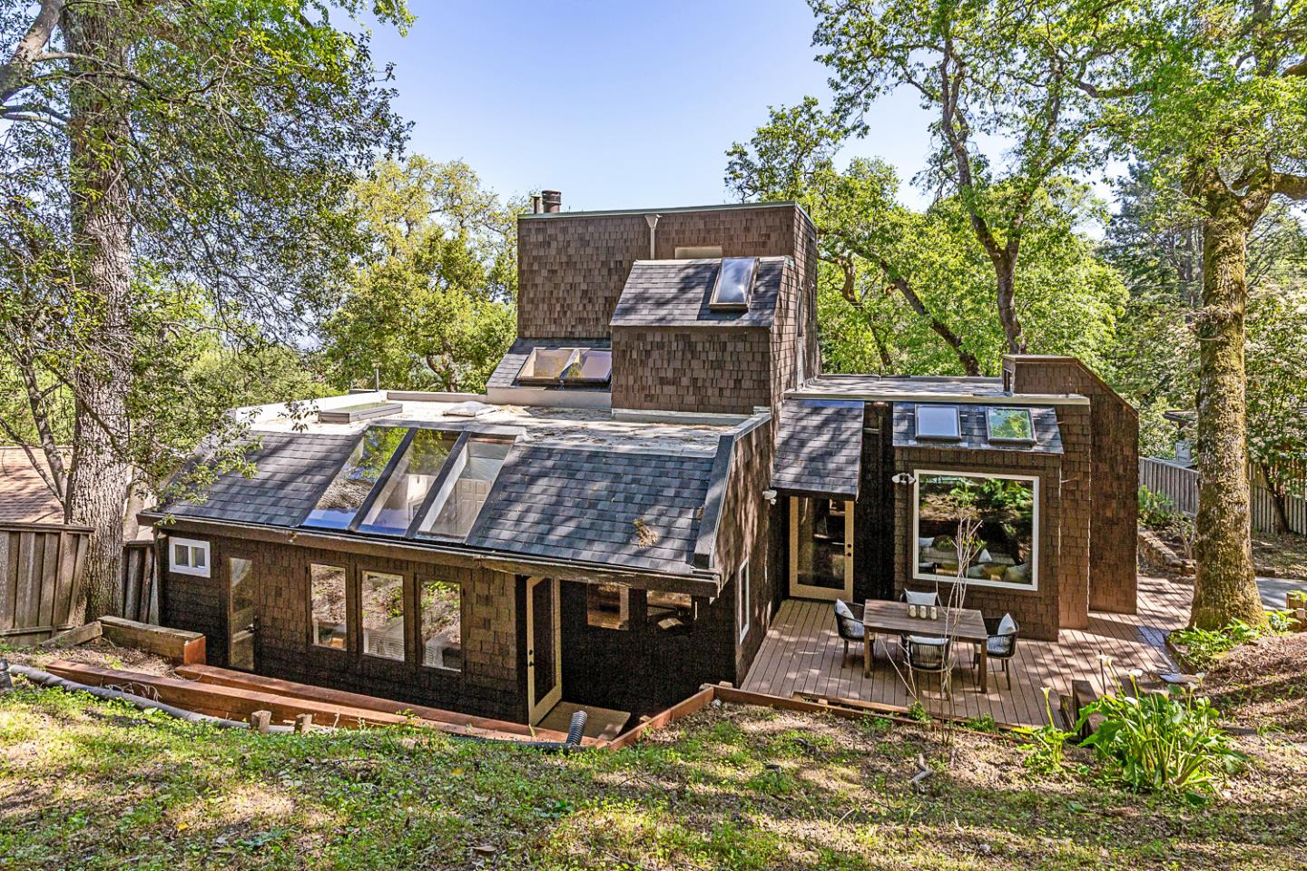128 Los Trancos Circle Portola Valley, CA 94028 - Photo 3 of 38 a view of a house with brick walls
