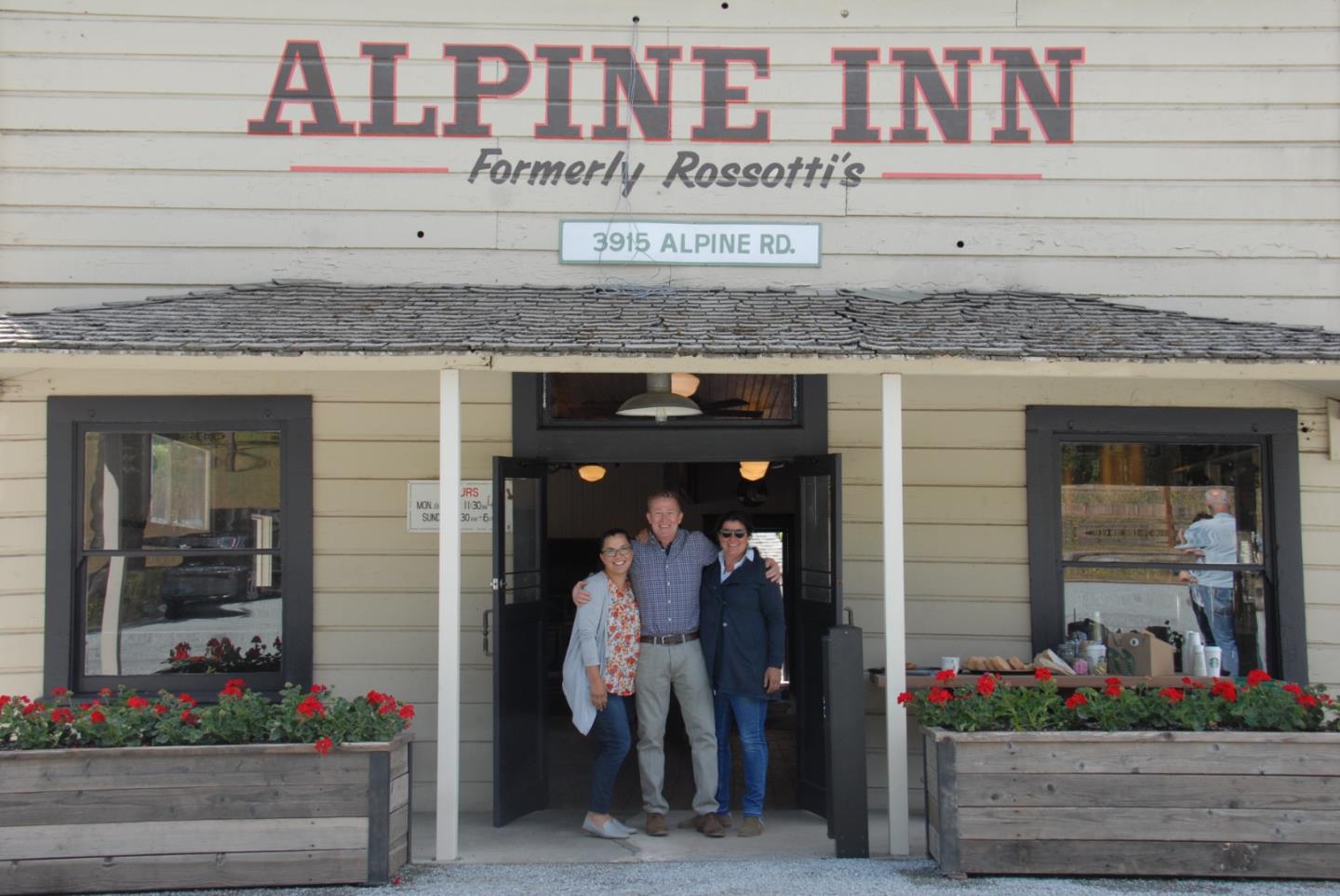 128 Los Trancos Circle Portola Valley, CA 94028 - Photo 32 of 38 a front view of a building with flowers
