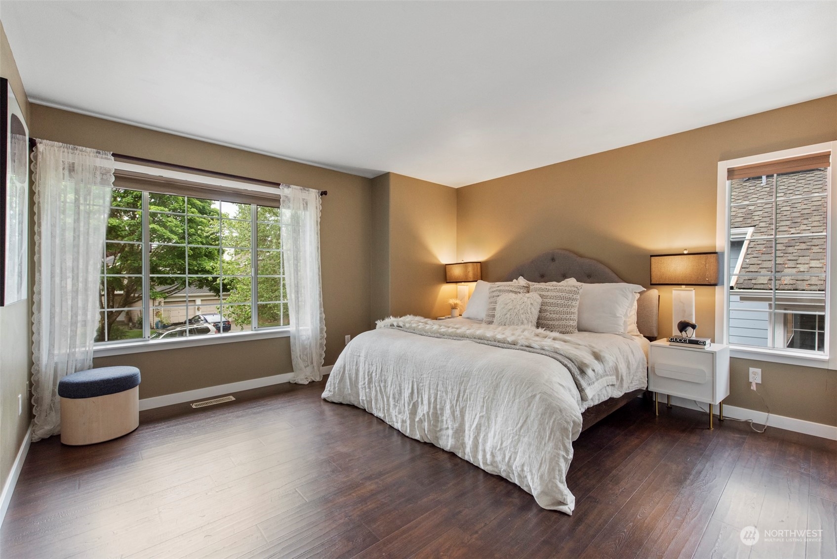 3545 252nd Place Southeast Sammamish, WA 98029 - Photo 14 of 31 a bedroom with a bed and a large window