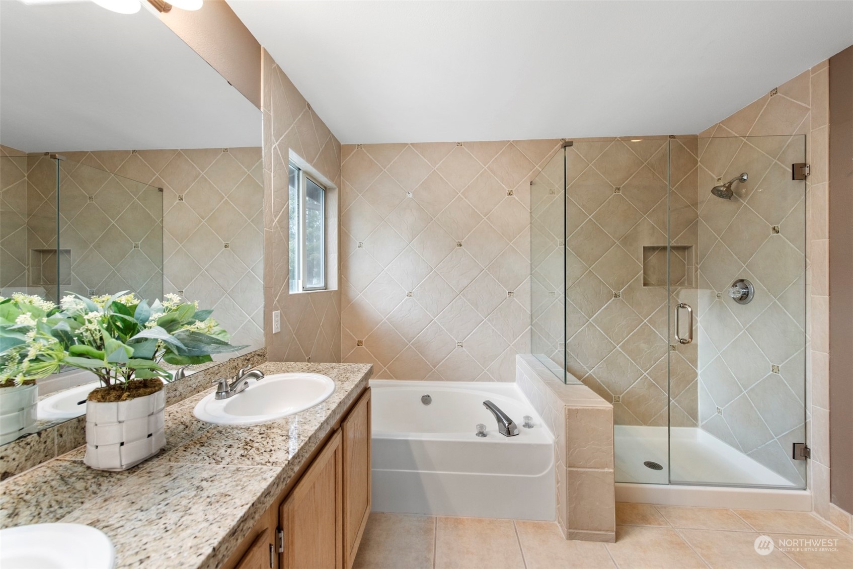 3545 252nd Place Southeast Sammamish, WA 98029 - Photo 18 of 31 a bathroom with a granite countertop sink a toilet and shower