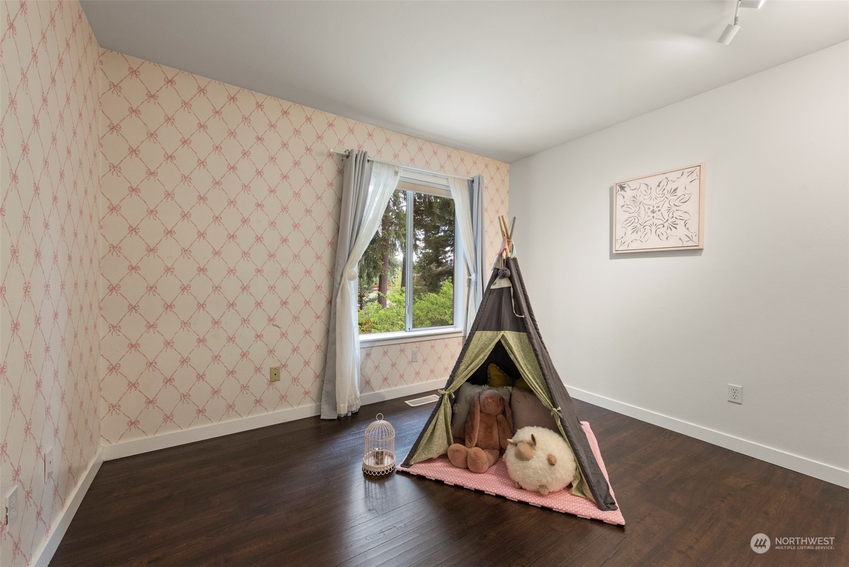 3545 252nd Place Southeast Sammamish, WA 98029 - Photo 21 of 31 a room with gym equipment and wooden floor