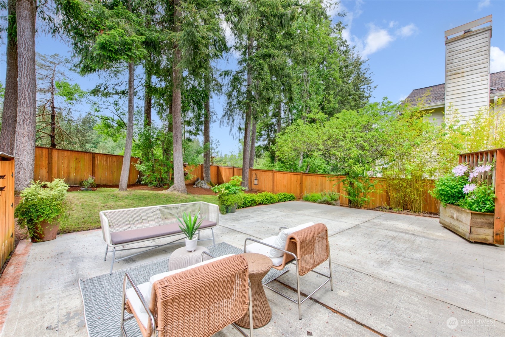 3545 252nd Place Southeast Sammamish, WA 98029 - Photo 23 of 31 a view of a backyard with sitting area