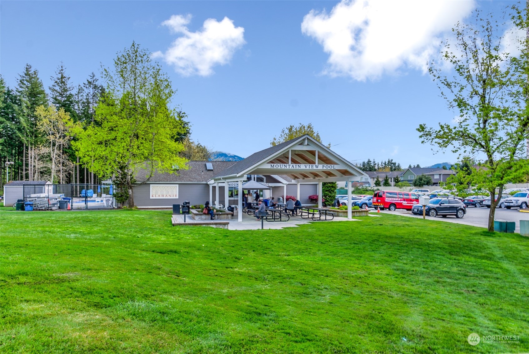 3545 252nd Place Southeast Sammamish, WA 98029 - Photo 28 of 31 a view of a house with a big yard and potted plants
