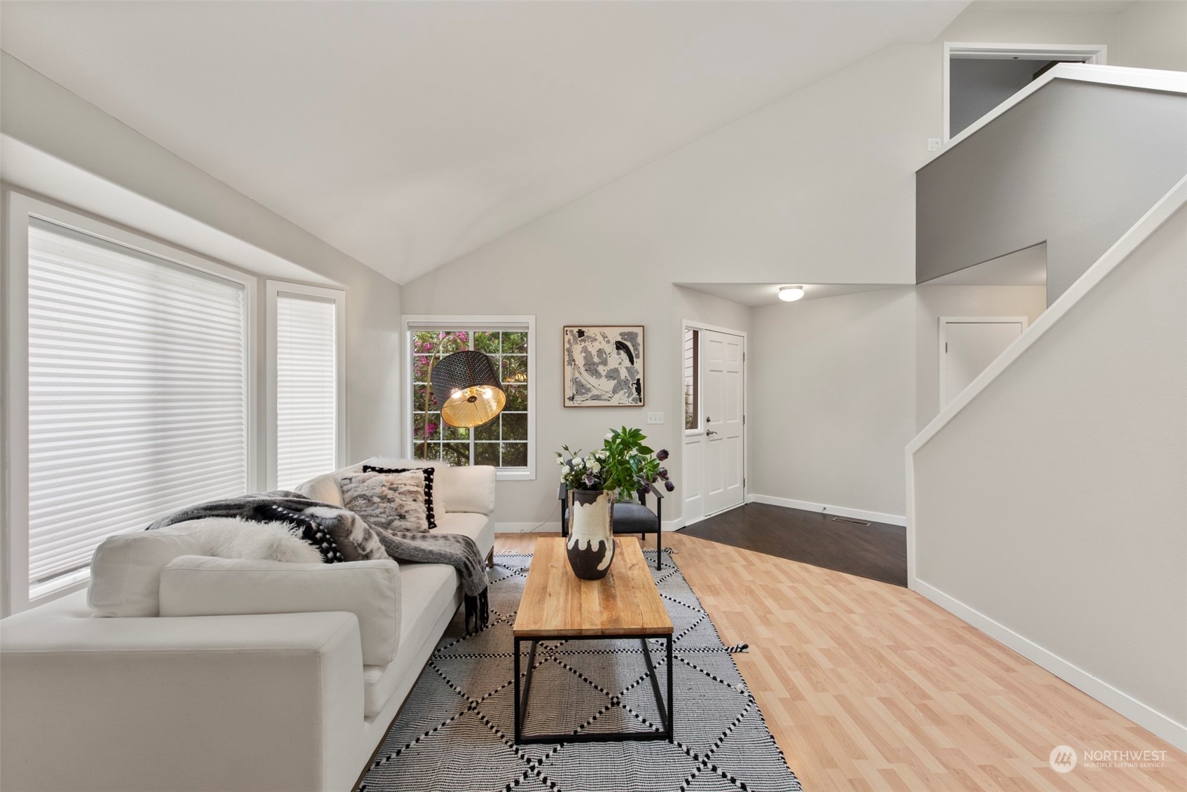 3545 252nd Place Southeast Sammamish, WA 98029 - Photo 4 of 31 a living room with furniture and wooden floor