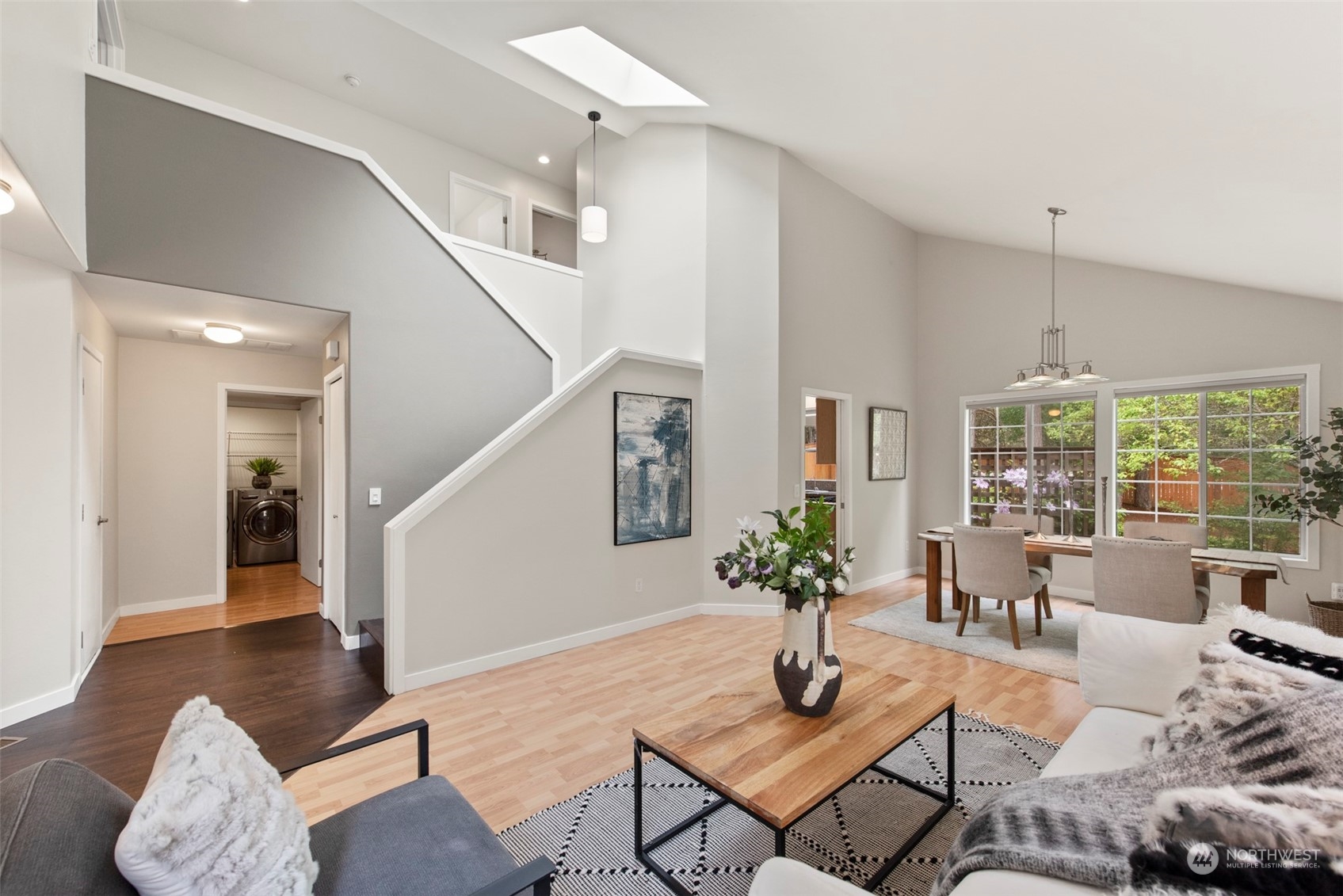 3545 252nd Place Southeast Sammamish, WA 98029 - Photo 5 of 31 a living room with furniture potted plant and a large window