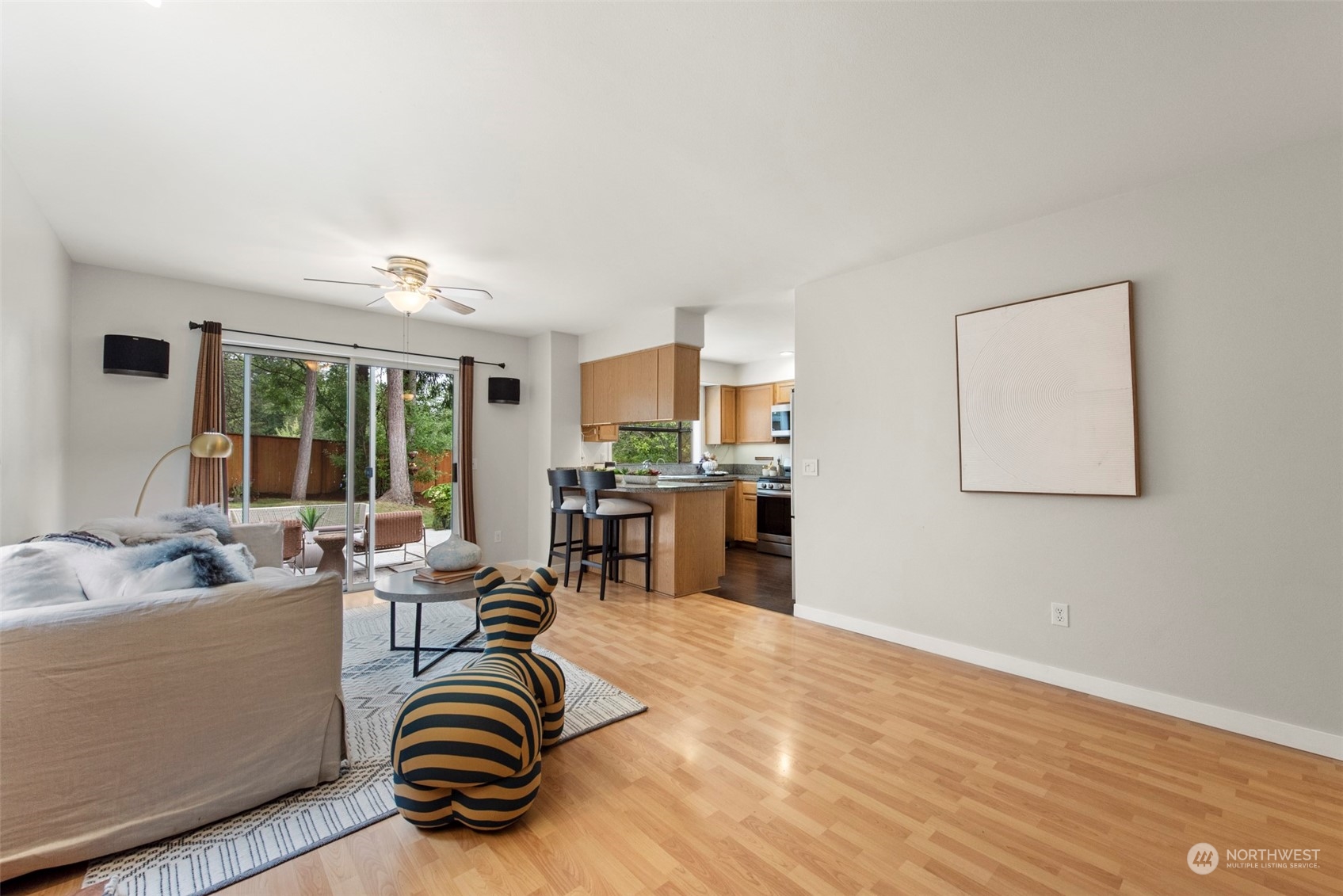 3545 252nd Place Southeast Sammamish, WA 98029 - Photo 9 of 31 a room with furniture and a large window