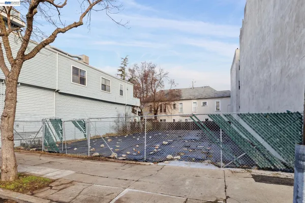 a view of a house with a street