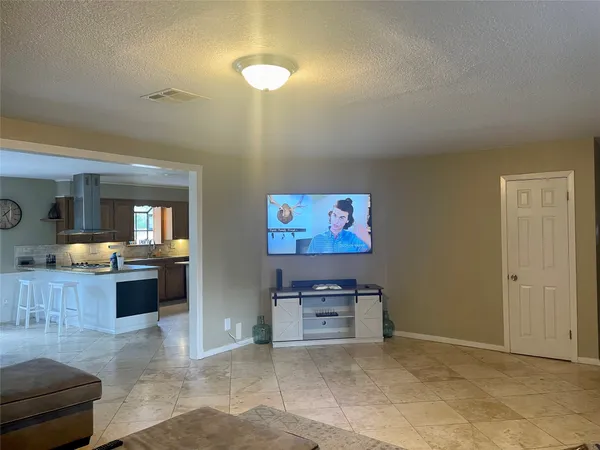 a view of workspace with furniture and window