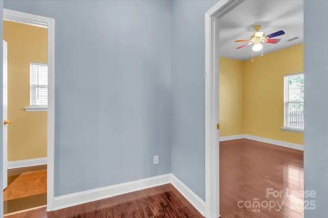 a view of an empty room and window