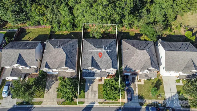an aerial view of house with outdoor space