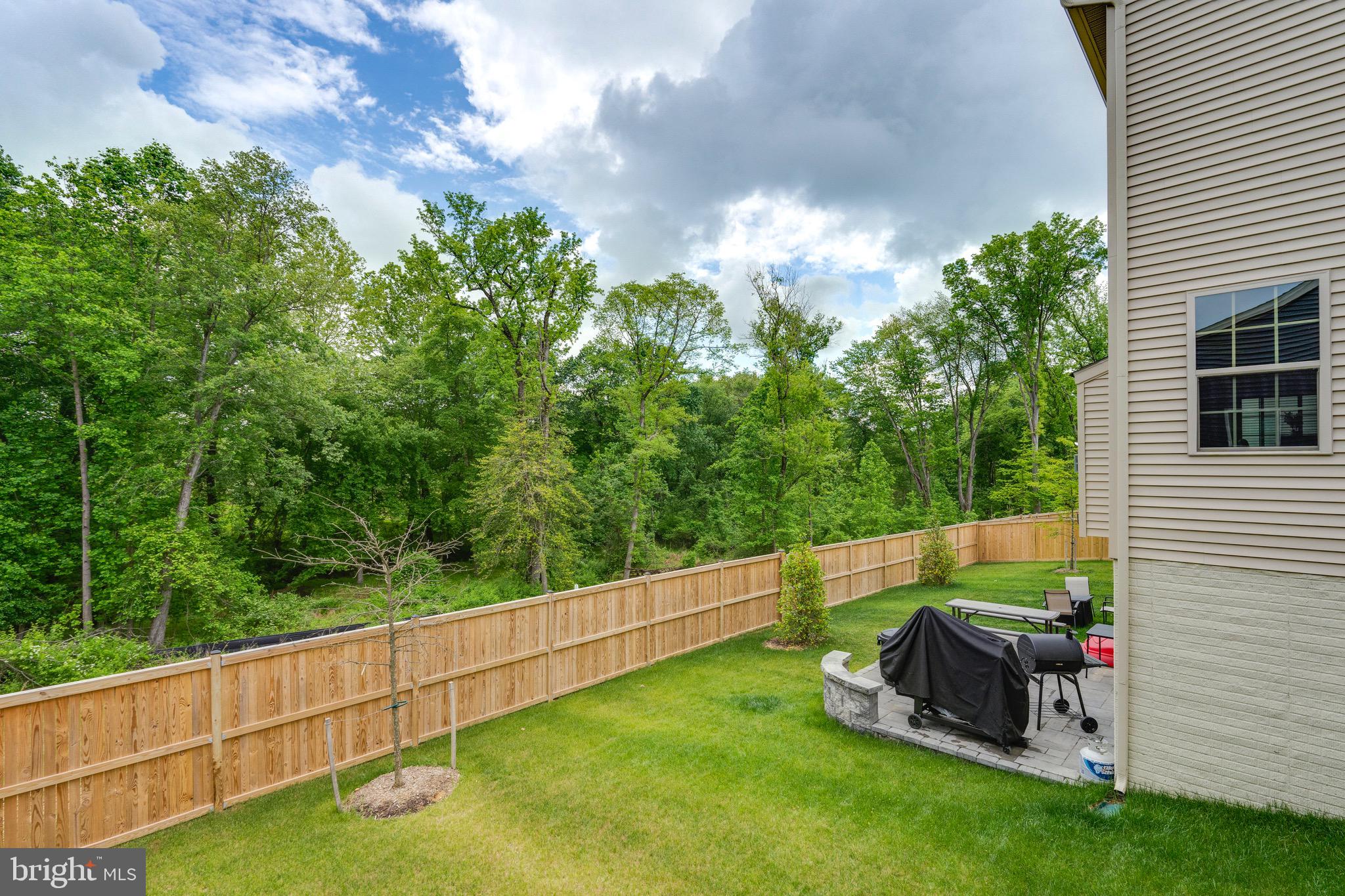 9004 Cavesson Way Upper Marlboro, MD 20772 - Photo 24 of 60 a view of a bench in the garden