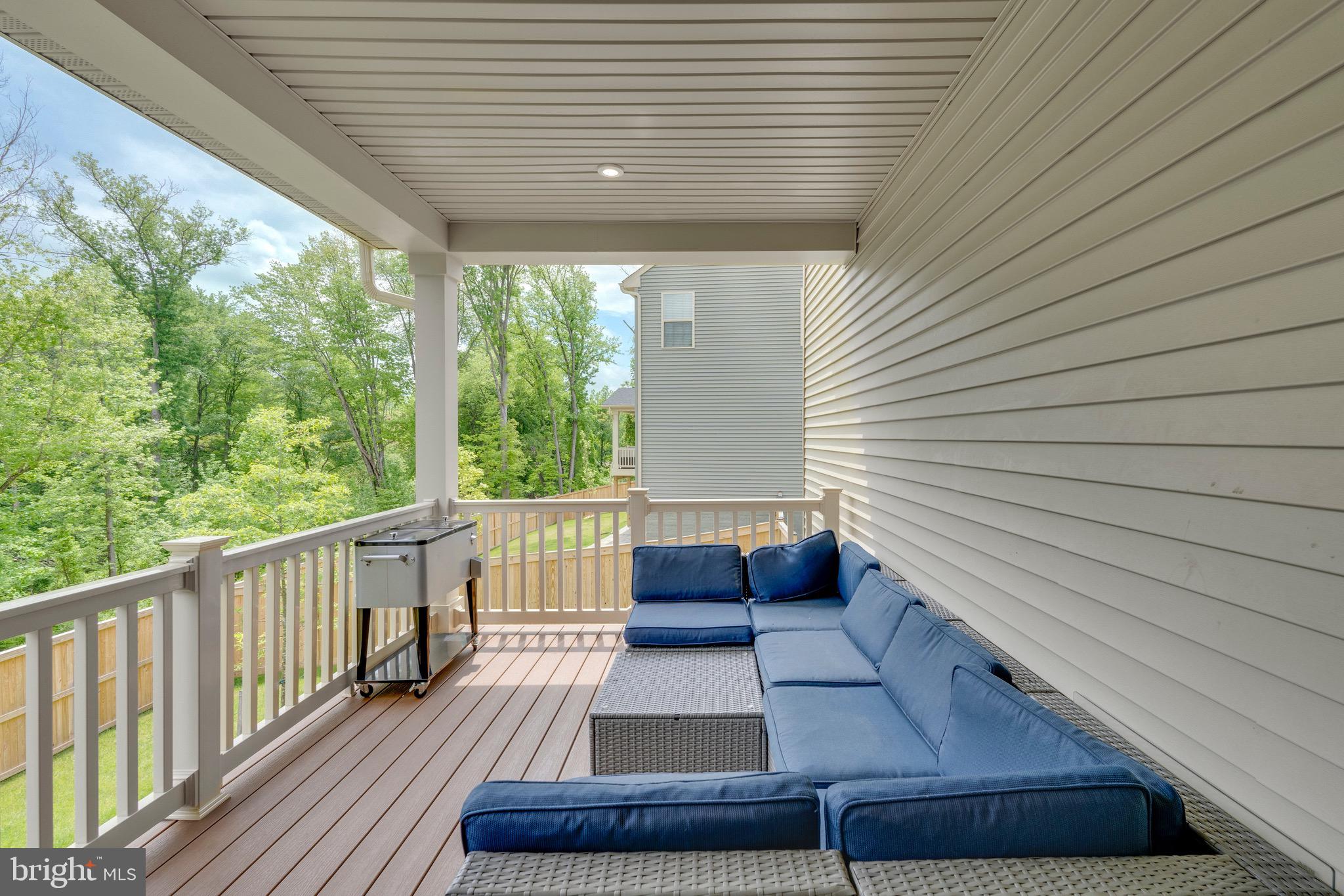 9004 Cavesson Way Upper Marlboro, MD 20772 - Photo 50 of 60 a view of balcony with furniture and wooden floor