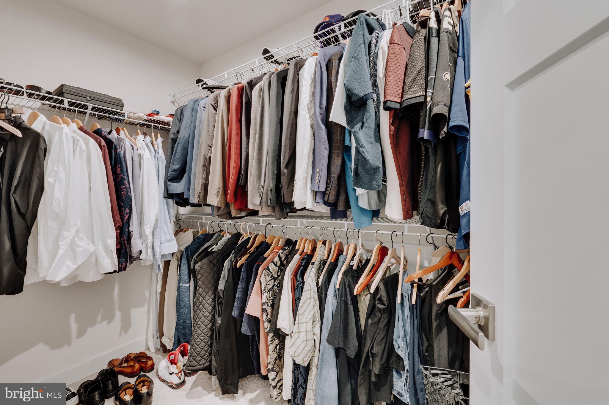 9004 Cavesson Way Upper Marlboro, MD 20772 - Photo 8 of 60 a view of walk in closet with clothes