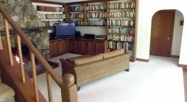 a view of balcony with furniture