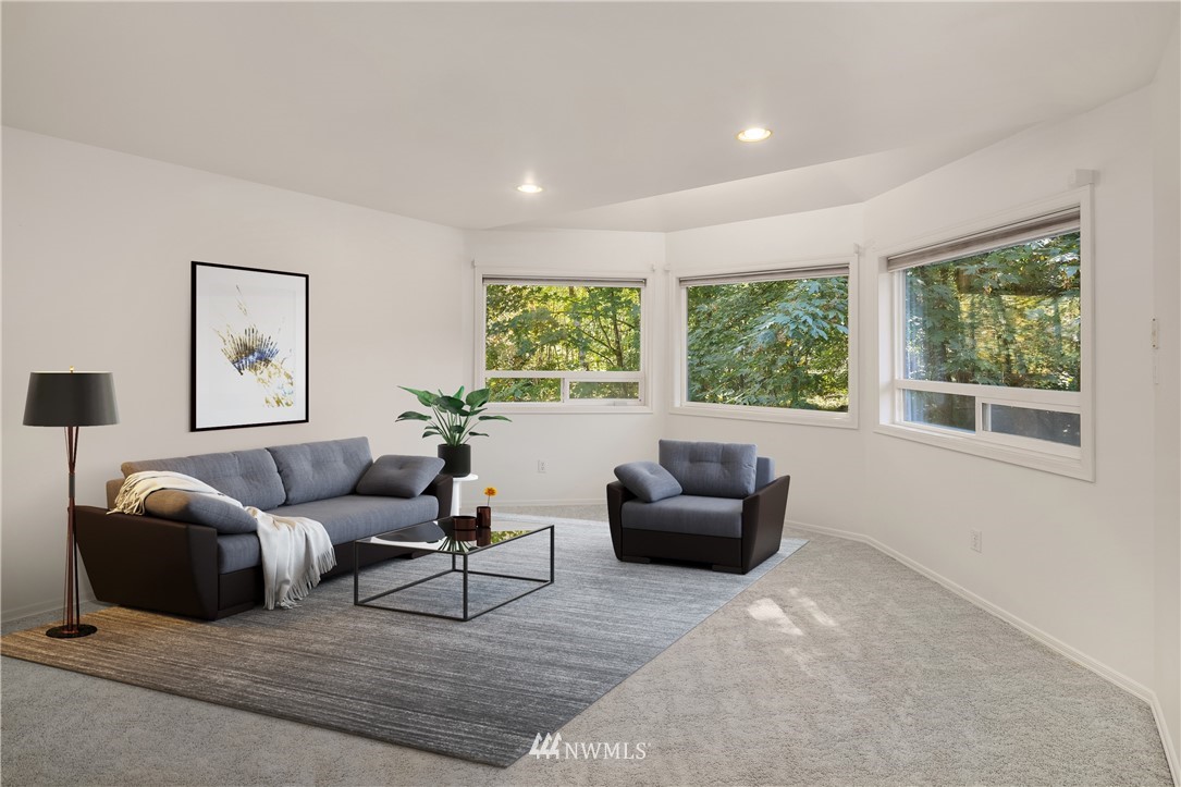 16425 Southeast Jones Road Renton, WA 98058 - Photo 22 of 40 a living room with furniture and a window