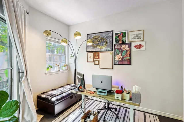 a room with furniture and a window