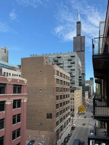 a front view of a building with glass windows