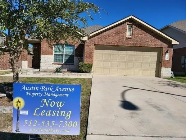 a front view of house with yard