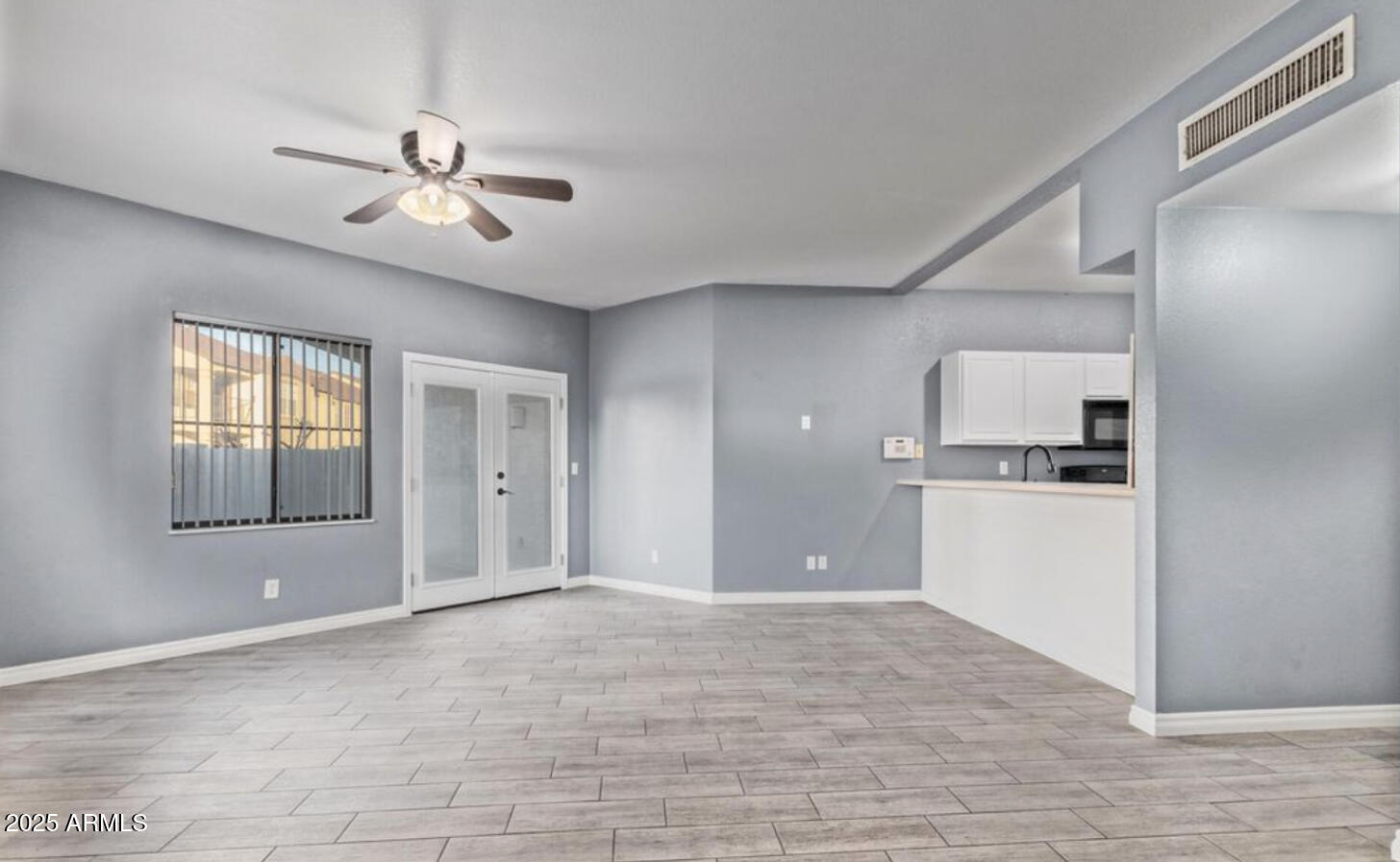 280 South Elizabeth Way, Unit 14 Chandler, AZ 85225 - Photo 11 of 26 a view of a kitchen with a sink and cabinet