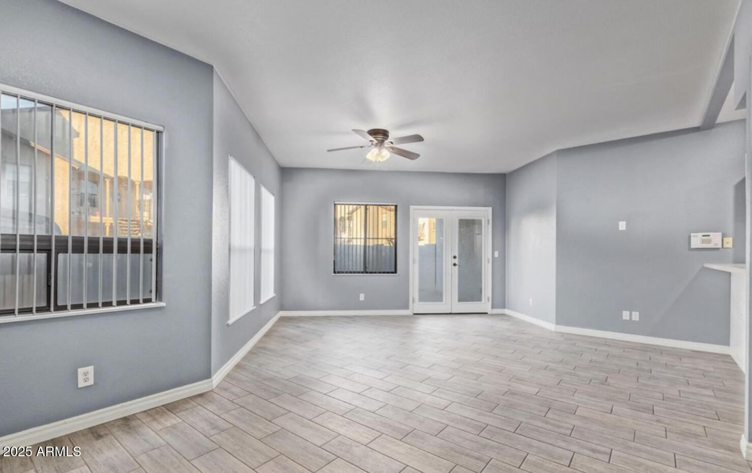 280 South Elizabeth Way, Unit 14 Chandler, AZ 85225 - Photo 19 of 26 a view of an empty room with a window