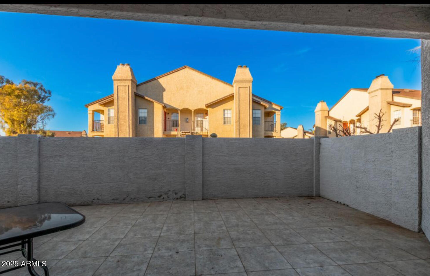 280 South Elizabeth Way, Unit 14 Chandler, AZ 85225 - Photo 26 of 26 a view of a brick wall next to a building