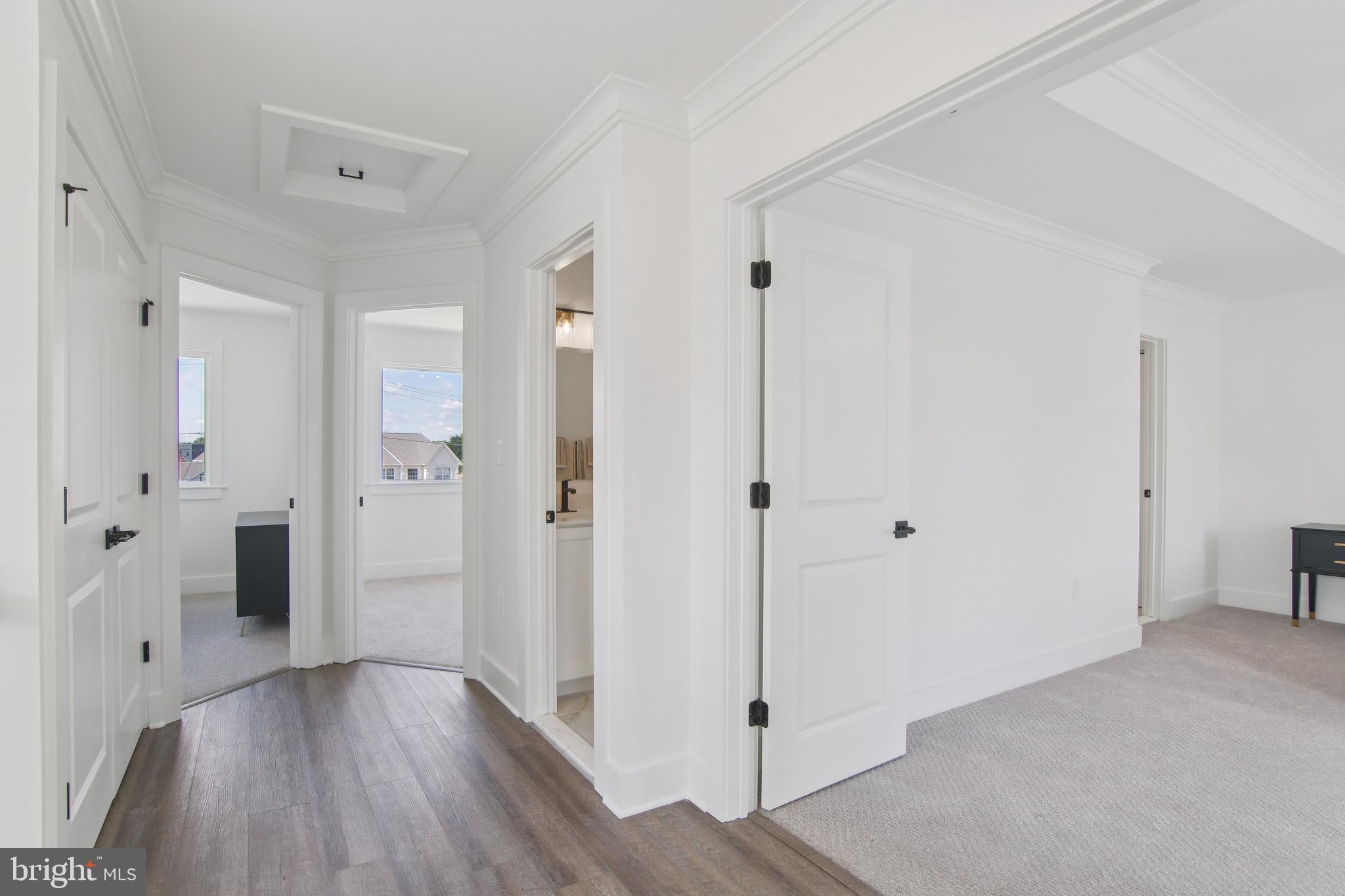 9838 Legion Street, Unit 3 Philadelphia, PA 19114 - Photo 18 of 51 a view of a bathroom with wooden floor