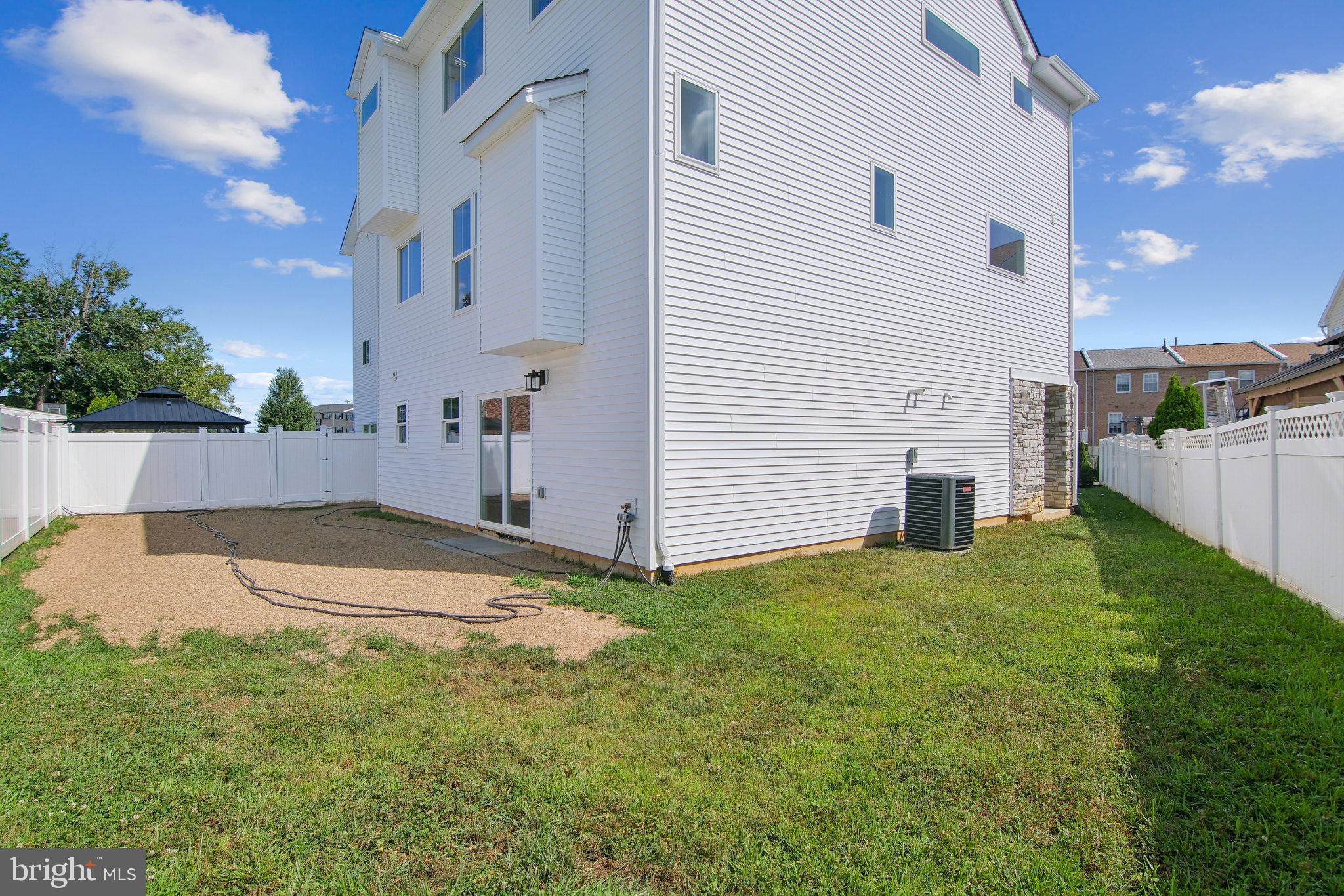 9838 Legion Street, Unit 3 Philadelphia, PA 19114 - Photo 6 of 51 a view of backyard of house