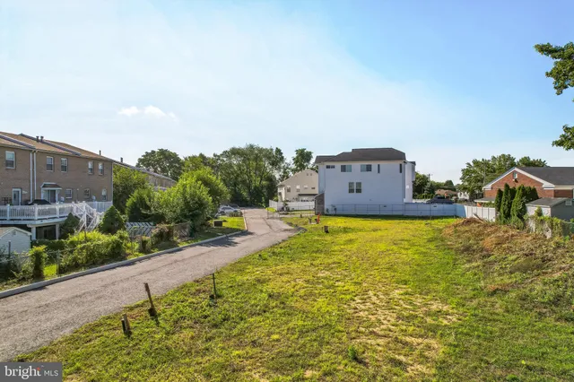 an aerial view of a house with a garden