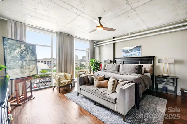 a bedroom with bed and a window