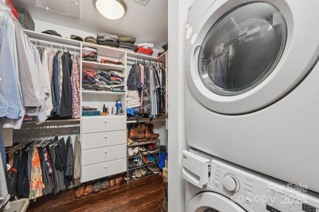 a bathroom with a shower a toilet and a shower