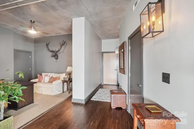 a living room with furniture and a table