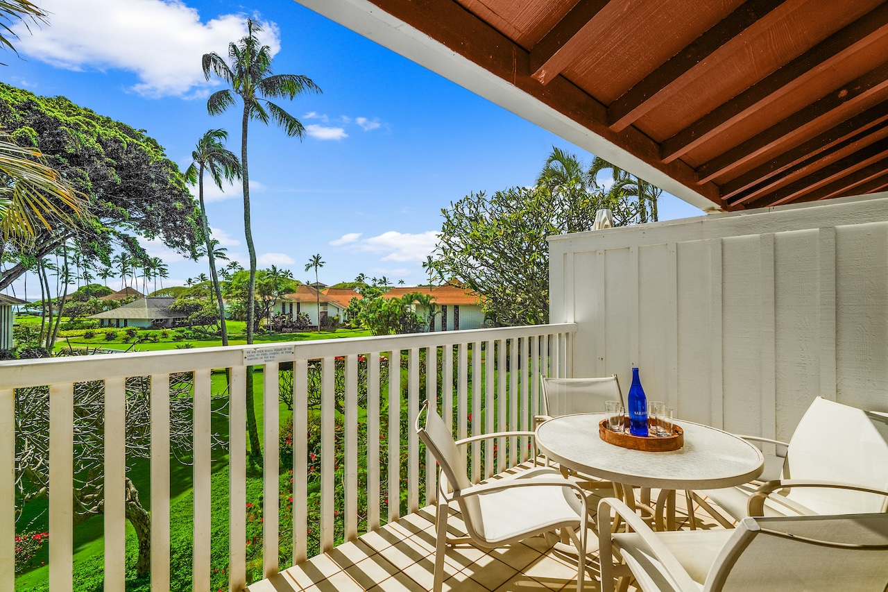 2253 Poipu Road, Unit 67 Koloa, HI 96756 - Photo 17 of 24 a backyard of a house with table and chairs