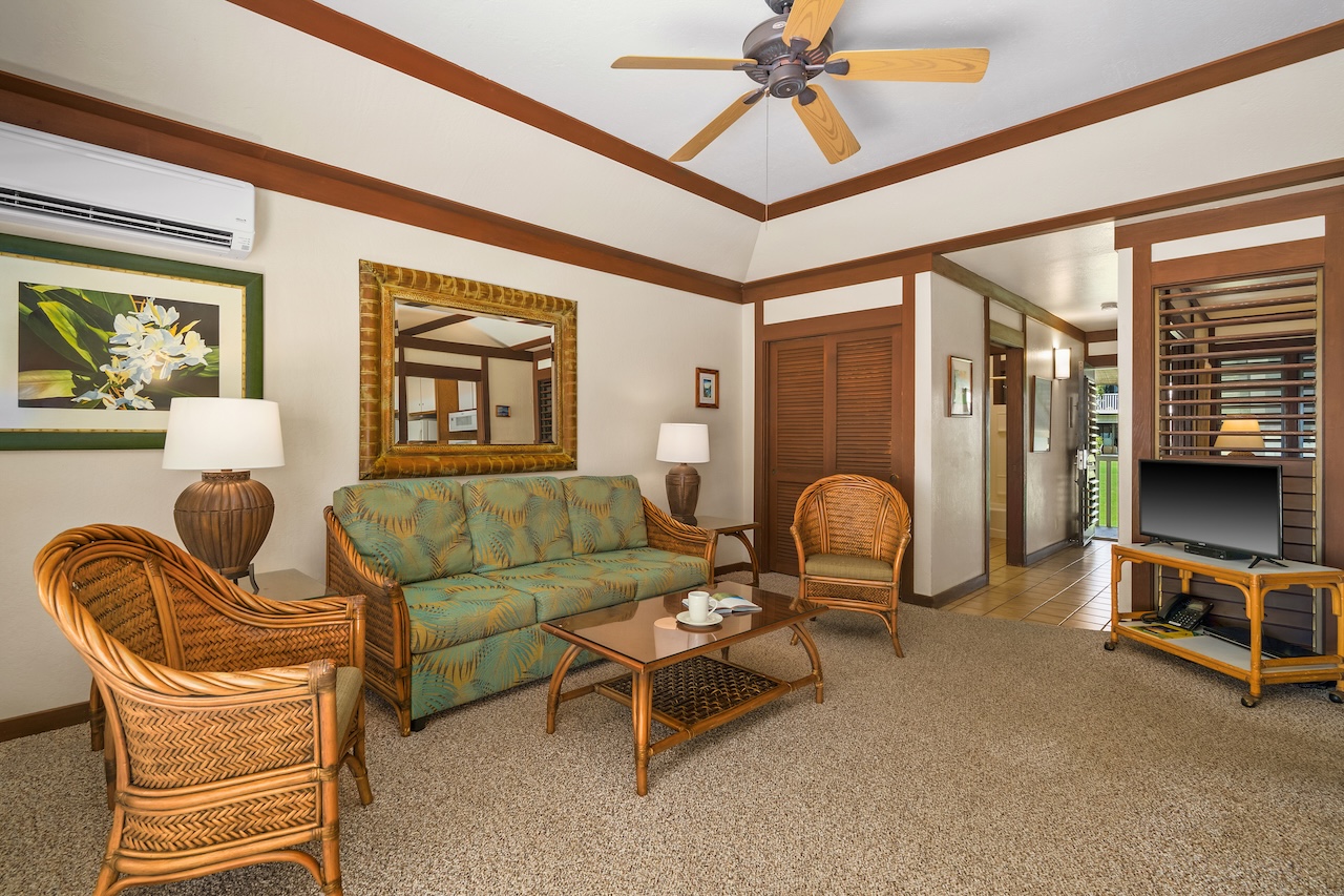 2253 Poipu Road, Unit 67 Koloa, HI 96756 - Photo 2 of 24 a living room with furniture a ceiling fan and a window