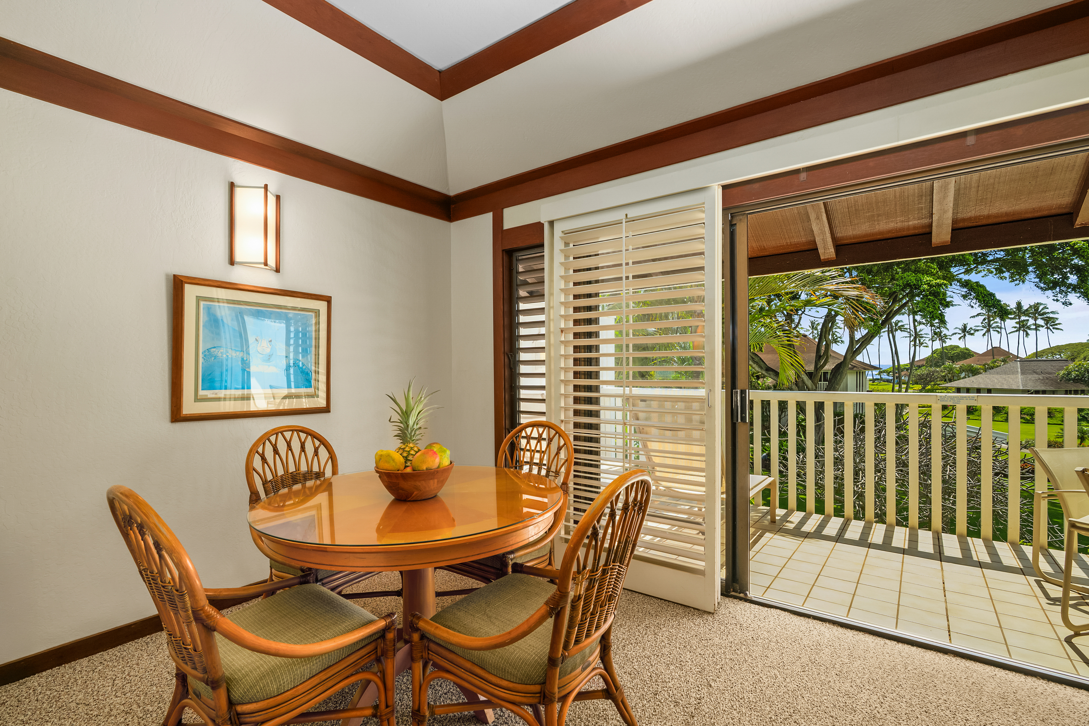 2253 Poipu Road, Unit 67 Koloa, HI 96756 - Photo 4 of 24 a view of a dining room with furniture and a window