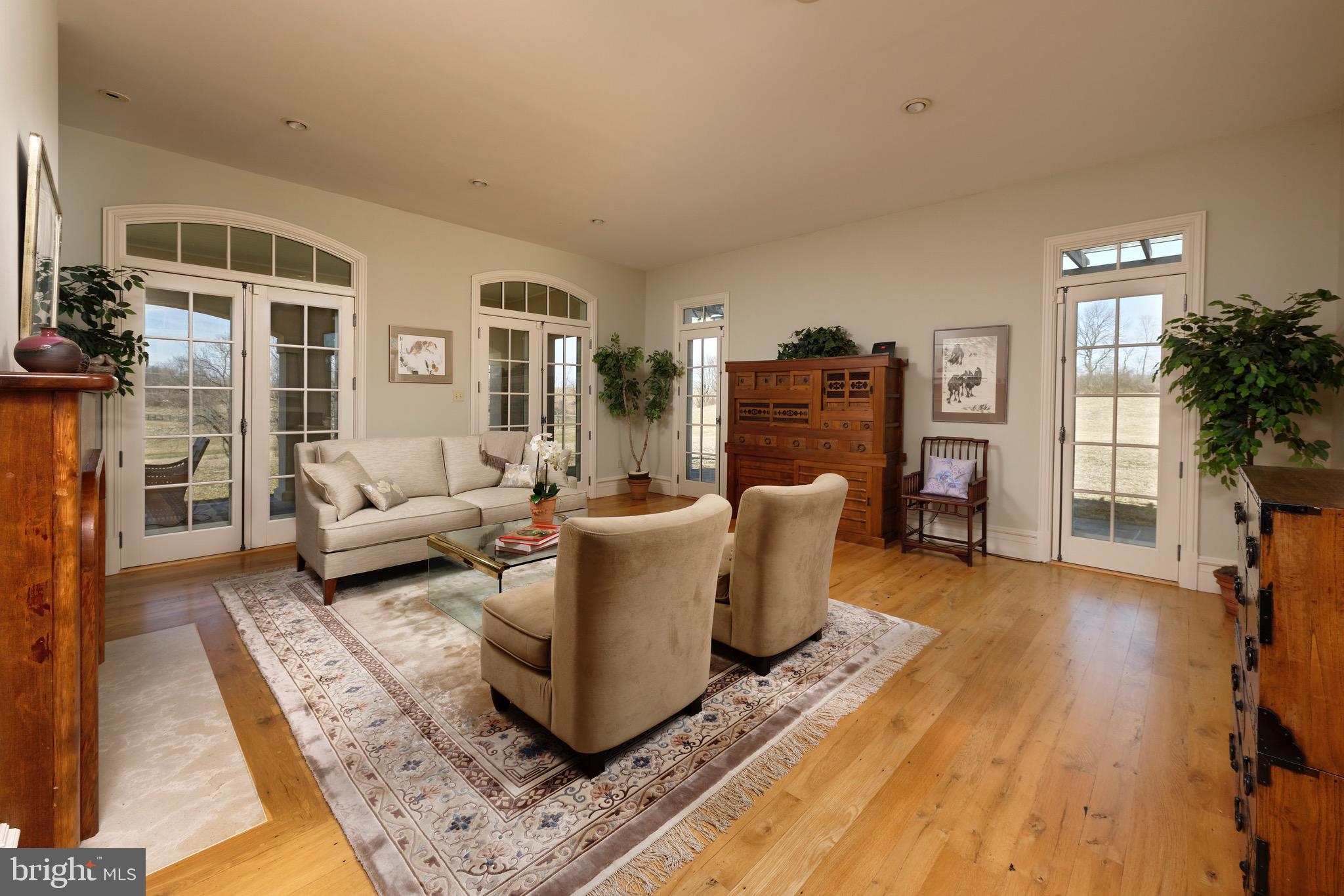 3456 Whiting Road Marshall, VA 20115 - Photo 10 of 69 Living Room has 4 doors to loggia & side pergola