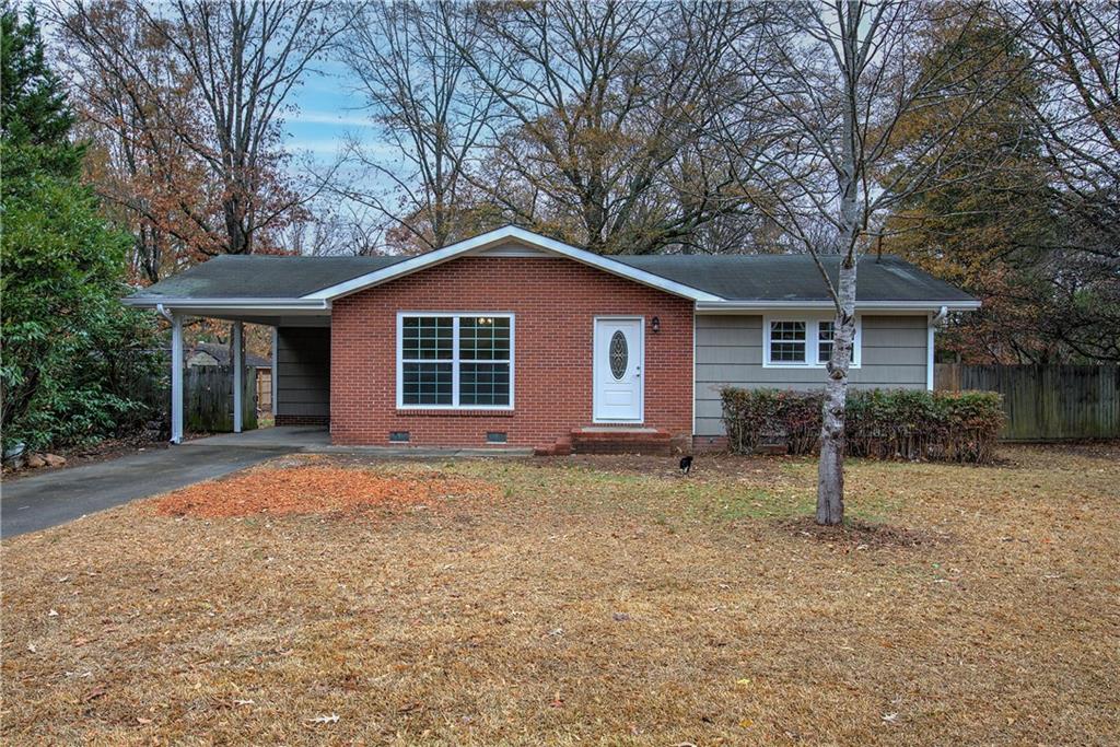 22 Highland Boulevard Northwest Rome, GA 30165 - Photo 1 of 1 a view of a house with a yard and large tree