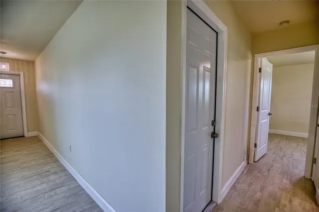 a bathroom with a sink mirror toilet and shower