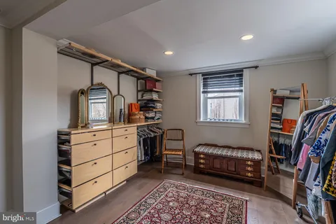 a view of entryway with wooden floor