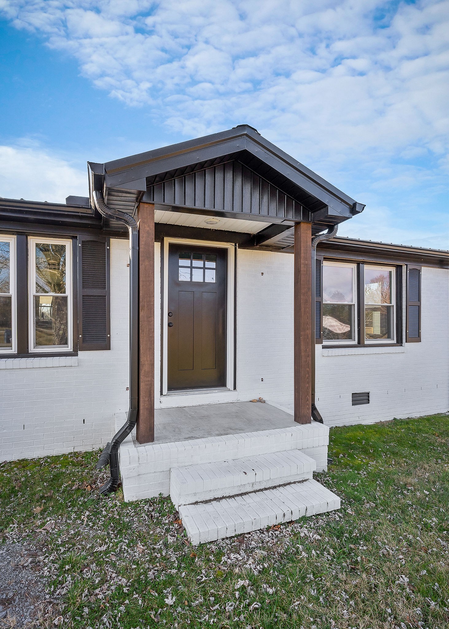 763 Smith Road Smithville, TN 37166 - Photo 26 of 29 a front view of a house with garden