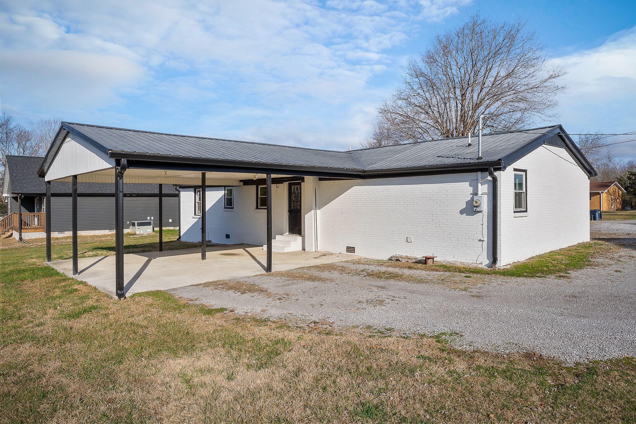 763 Smith Road Smithville, TN 37166 - Photo 27 of 29 a view of a house with a snow in the yard