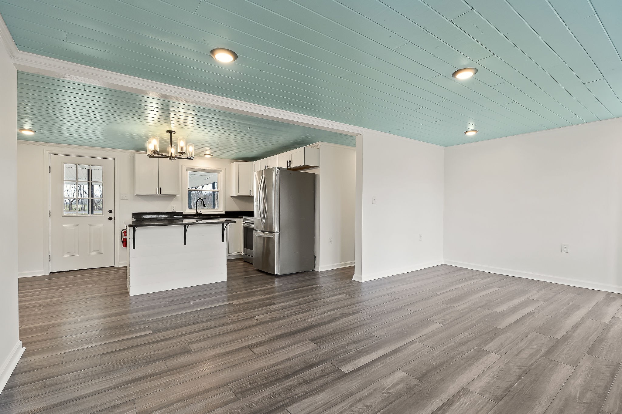 763 Smith Road Smithville, TN 37166 - Photo 3 of 29 a view of kitchen appliances wooden floor and a window