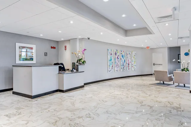 a view of room with furniture and window